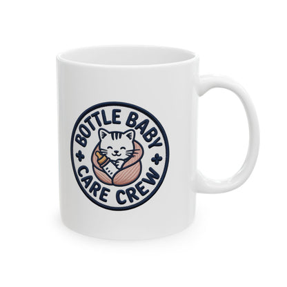 https://images.printify.com/mockup/6a796e925a2e76f8ba02f3c3/65216/6311/bottle-baby-care-crew-white-coffee-mug.jpg?camera_label=right